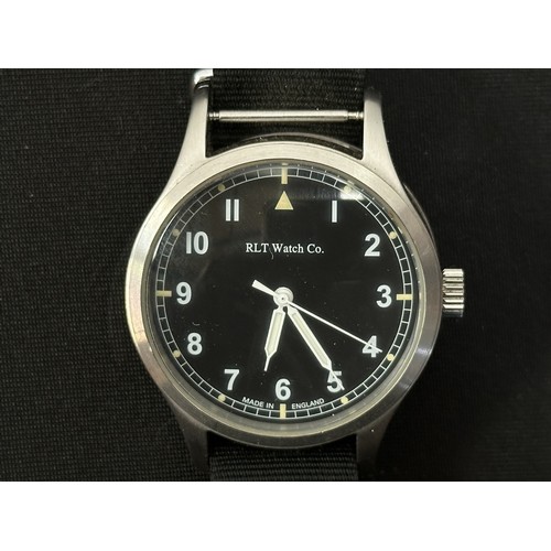 2300 - RLT Watch Co Military style Wristwatch on a black Nylon strap. Black dial with Arabic numerals. Mark... 