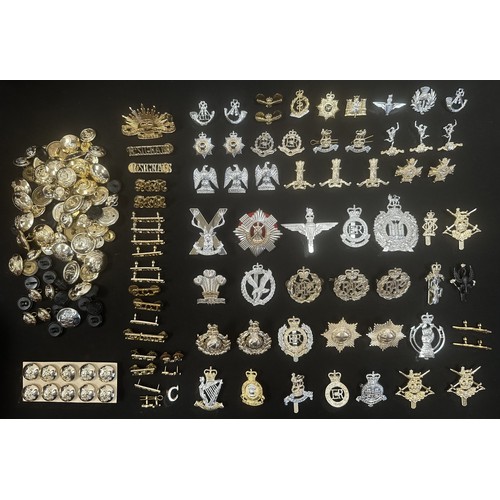 2318 - Post War British Army ERII Staybrite Cap badges, collar dogs, shoulder titles and buttons.