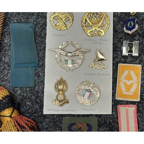 2320 - Post War cap badges and US, Kuwaiti & West German cloth insignia, British Bugle cords, etc.