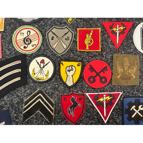 2320 - Post War cap badges and US, Kuwaiti & West German cloth insignia, British Bugle cords, etc.