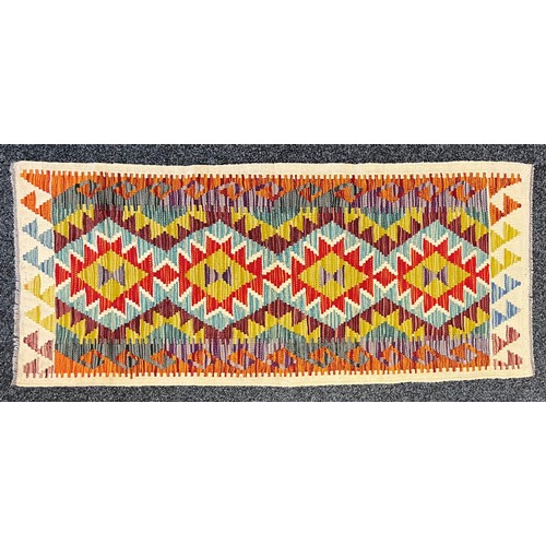 383 - Oriental Rugs and Carpets - a Chobi Kilim runner, 150cm x 64cm