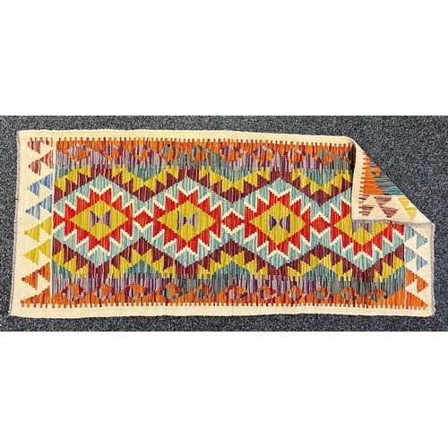 383 - Oriental Rugs and Carpets - a Chobi Kilim runner, 150cm x 64cm