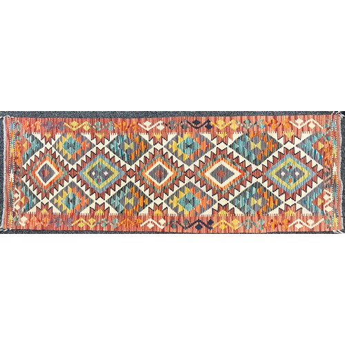 385 - Oriental Rugs and Carpets - a Chobi Kilim runner, 197cm x 69cm