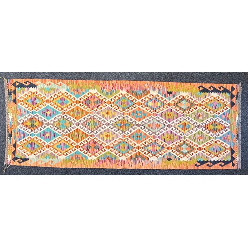 389 - Oriental Rugs and Carpets - a Chobi Kilim runner, 237cm x 90cm