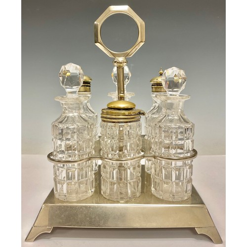 407 - An Art Deco Wildman's Patent plated six bottle cruet set and stand, 25cm high