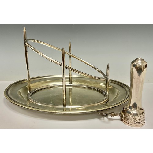 408 - A Victorian plated ham holder, chased with foliate scrolls, 13.5cm long; a late 19th/early 20th cent... 