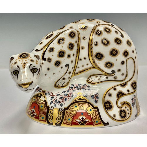 9 - A Royal Crown Derby paperweight, Snow Leopard, gold stopper, 15cm wide, printed mark in red