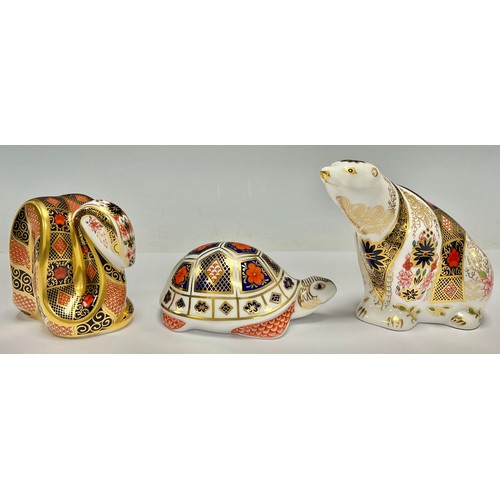 19 - A Royal Crown Derby paperweight, Imari Polar Bear, printed in the 1128 palette, 11cm, gold stopper; ... 