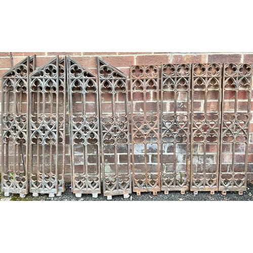 406 - Architectural Salvage - a suite of twelve Gothic Revival cast iron grilles or balusters, cast with t... 