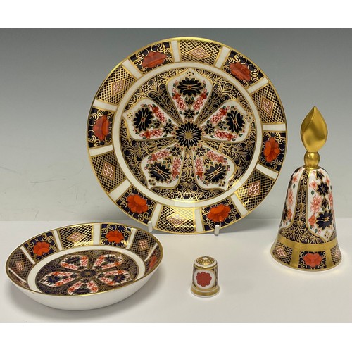 489 - A Royal Crown Derby Imari palette 1128 pattern candle snuffer, first quality; an 1128 circular pin d... 