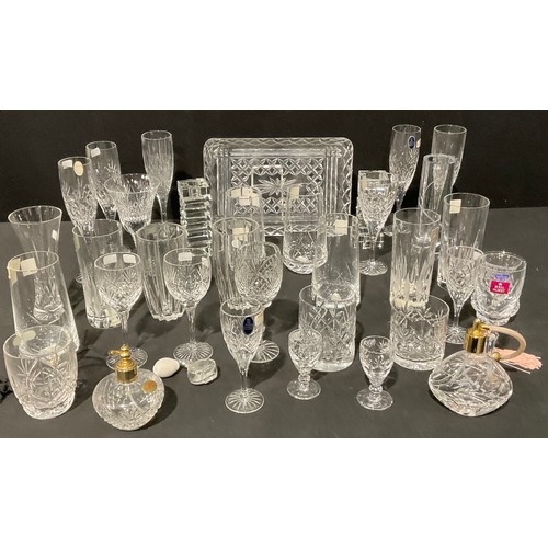 493 - Glassware - a collection of boxed and unboxed glass drinking glasses including various lead crystal ... 