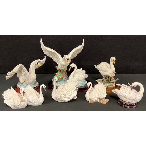 496 - A Giuseppe Armani Florence resin model of a swan, wooden stand, 10cm; other similar resin swan model... 