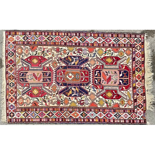 506 - A Persian Sumak Kilim design rug or carpet, 194cm x 129cm