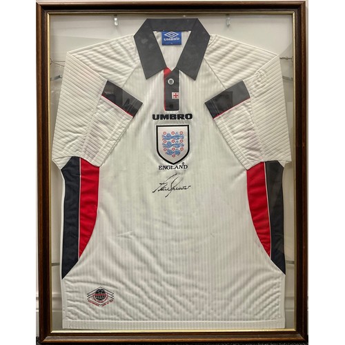 512 - Sport, Football - An England Umbro shirt, signed by Alan Shearer, framed