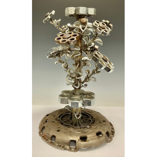 513 - Steam Punk - a sculptural table centre as a vase of flowers, constructed from car parts, nuts and bo... 