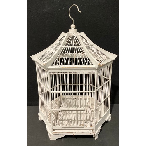 520 - A 19th century style pagoda form bird cage, 57cm high