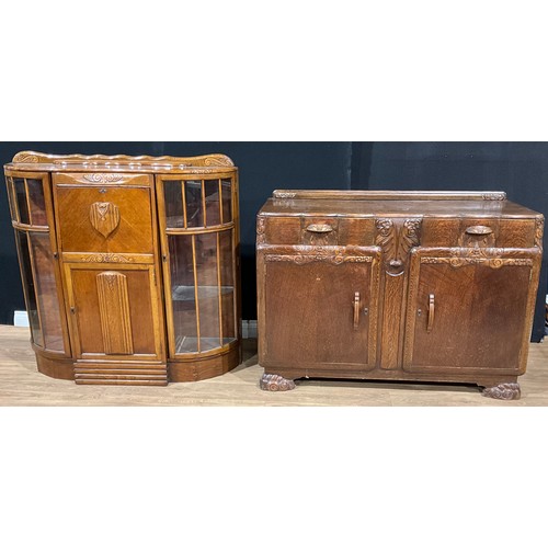 527 - A mid-20th century Post-Art Deco oak sideboard, 100.5cm high, 138cm wide, 52.5cm deep; another, Eliz... 