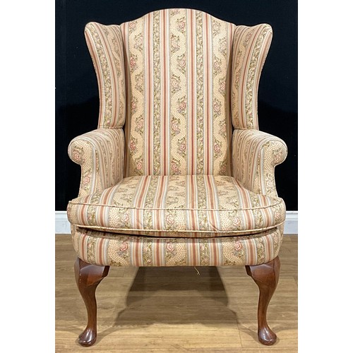 529 - A contemporary George II style wing chair, 111cm high, 78.5cm wide, the seat 52cm wide and 54cm deep