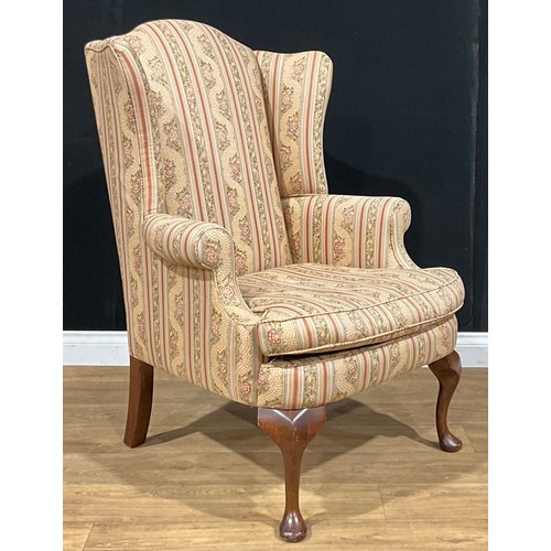 529 - A contemporary George II style wing chair, 111cm high, 78.5cm wide, the seat 52cm wide and 54cm deep