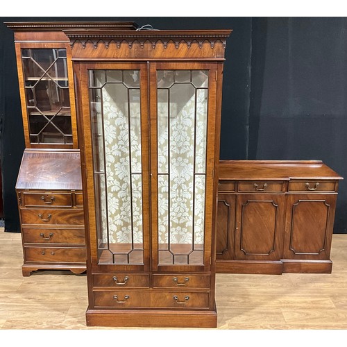 531 - A George III style bureau bookcase, 196.5cm high, 96.5cm wide, 47cm deep; a similar break-centre sid... 