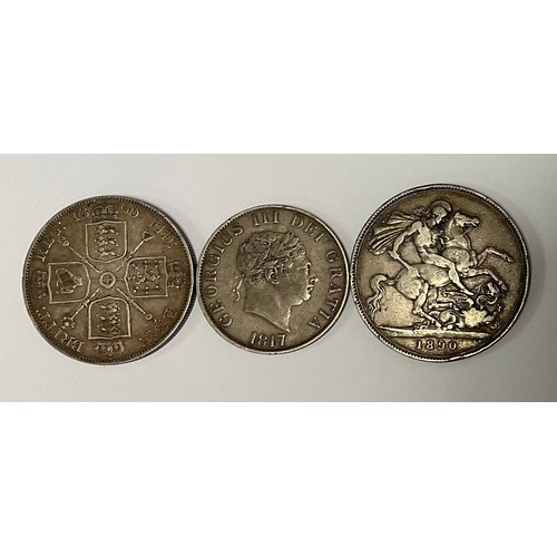 554 - A George III silver half crown, 1817; a Victorian silver crown and a half crown, 1890 (3)