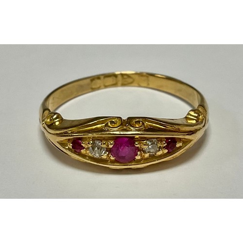 556 - An 18ct gold ruby and diamond ring, size P, 3.4g