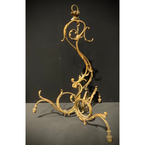 566 - An early 20th century French Rococo design brass three branch electrolier, 80cm high