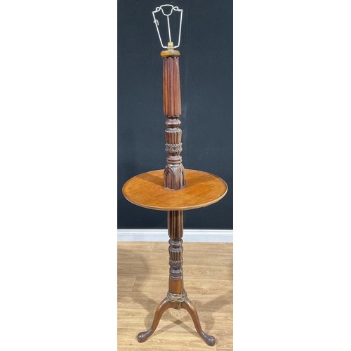 571 - A mahogany tripod floor lamp, 161cm high under fitting