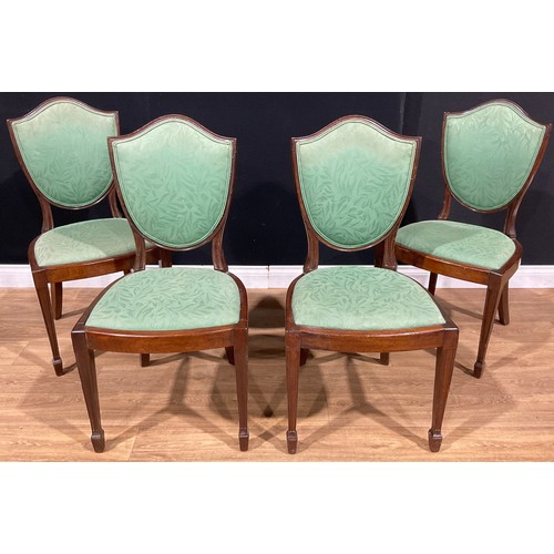 117 - A set of four early 20th century shield back dining chairs, by James Shoolbred & Co (fl.1814-c.1934)... 