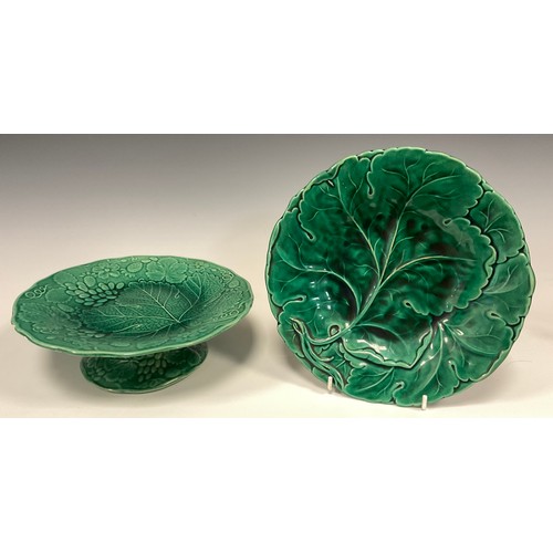 340 - A pair of Wedgwood majolica shallow leaf dishes, impressed marks, 24cm wide; another pair unmarked, ... 