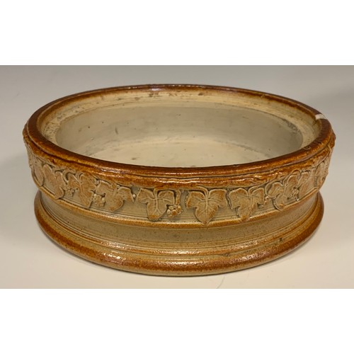 372 - A 19th century S & H Briddon Brampton salt glazed stoneware oval pie dish and cover, relief decorate... 