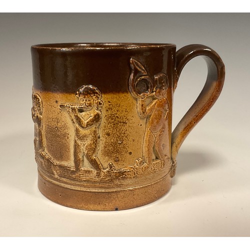 370 - A 19th century Brampton stoneware coffee pot and cover, relief decorated with Dogs and Figures, flor... 