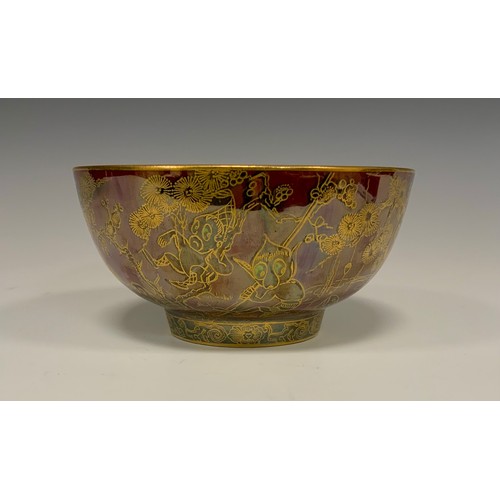 318 - A Wedgwood Fairyland Lustre Firbolgs pattern bowl designed by Daisy Makeig-Jones, the exterior in bl... 