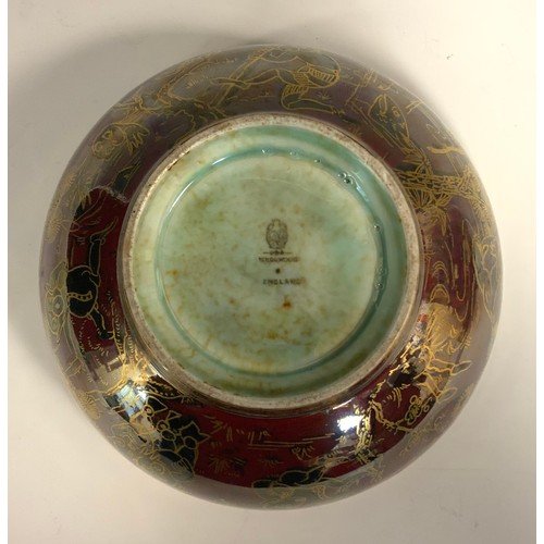 318 - A Wedgwood Fairyland Lustre Firbolgs pattern bowl designed by Daisy Makeig-Jones, the exterior in bl... 