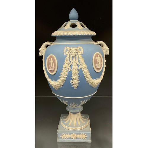 319 - A Wedgwood 'tri-colour' jasper ware urn and cover, late 19th/early 20th century, with Goat and Ram m... 