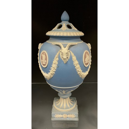 319 - A Wedgwood 'tri-colour' jasper ware urn and cover, late 19th/early 20th century, with Goat and Ram m... 