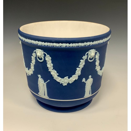 317 - A Wedgwood blue Jasperware planter, Lion mask and grape vine swags, above neoclassical figures, impr... 