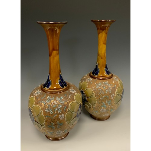 310 - A pair of Royal Doulton Art Nouveau Chine ware vases, shape number 5790, with elongated necks, decor... 