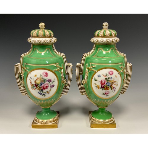 354 - A pair of 19th century Porcelain urn vases and covers, each painted with panels of Fruit and flowers... 