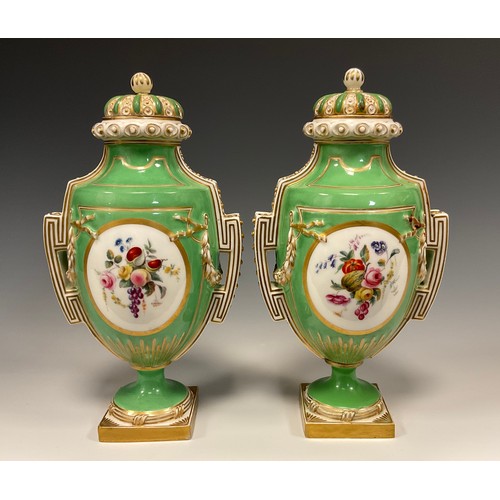 354 - A pair of 19th century Porcelain urn vases and covers, each painted with panels of Fruit and flowers... 