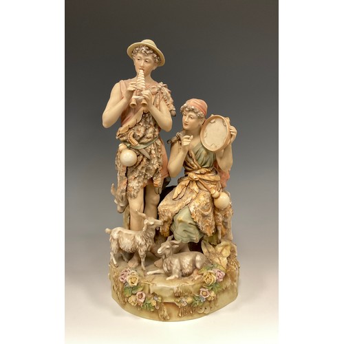 366 - An early 20th century Royal Dux figure group modelled with shepherd and shepherdess musicians, he wi... 