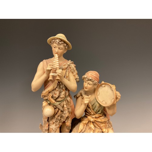 366 - An early 20th century Royal Dux figure group modelled with shepherd and shepherdess musicians, he wi... 