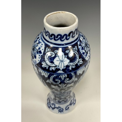 362 - A Delft Blue and White under-glazed Meiping shaped vase, under-glazed mark to base, 21cm high, c.190... 