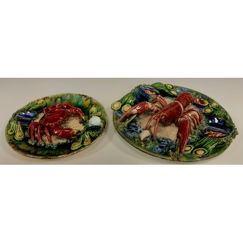 361 - A 20th century Continental Majolica lobster plate, 28cm diameter; a similar smaller crab plate, 22cm... 