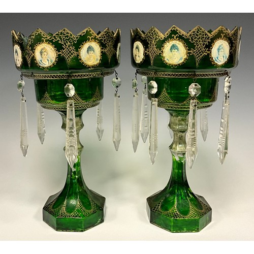 392 - A pair of 19th century green and clear glass crown top table lustres,  decorated with portrait panel... 