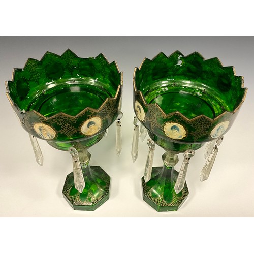 392 - A pair of 19th century green and clear glass crown top table lustres,  decorated with portrait panel... 