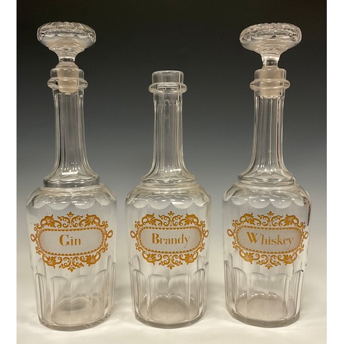 395 - A set of three 19th century hand engraved decanters 