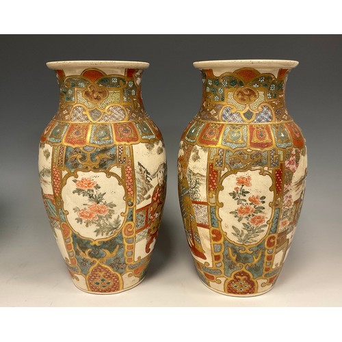 430 - A pair of Japanese, Meiji Period, Satsuma baluster-shaped vases, decorated with panels depicting Eld... 