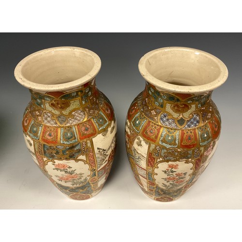 430 - A pair of Japanese, Meiji Period, Satsuma baluster-shaped vases, decorated with panels depicting Eld... 