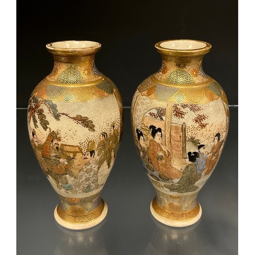 429 - A pair of Japanese Satsuma baluster vases, decorated with panels of Samurai and ladies within typica... 